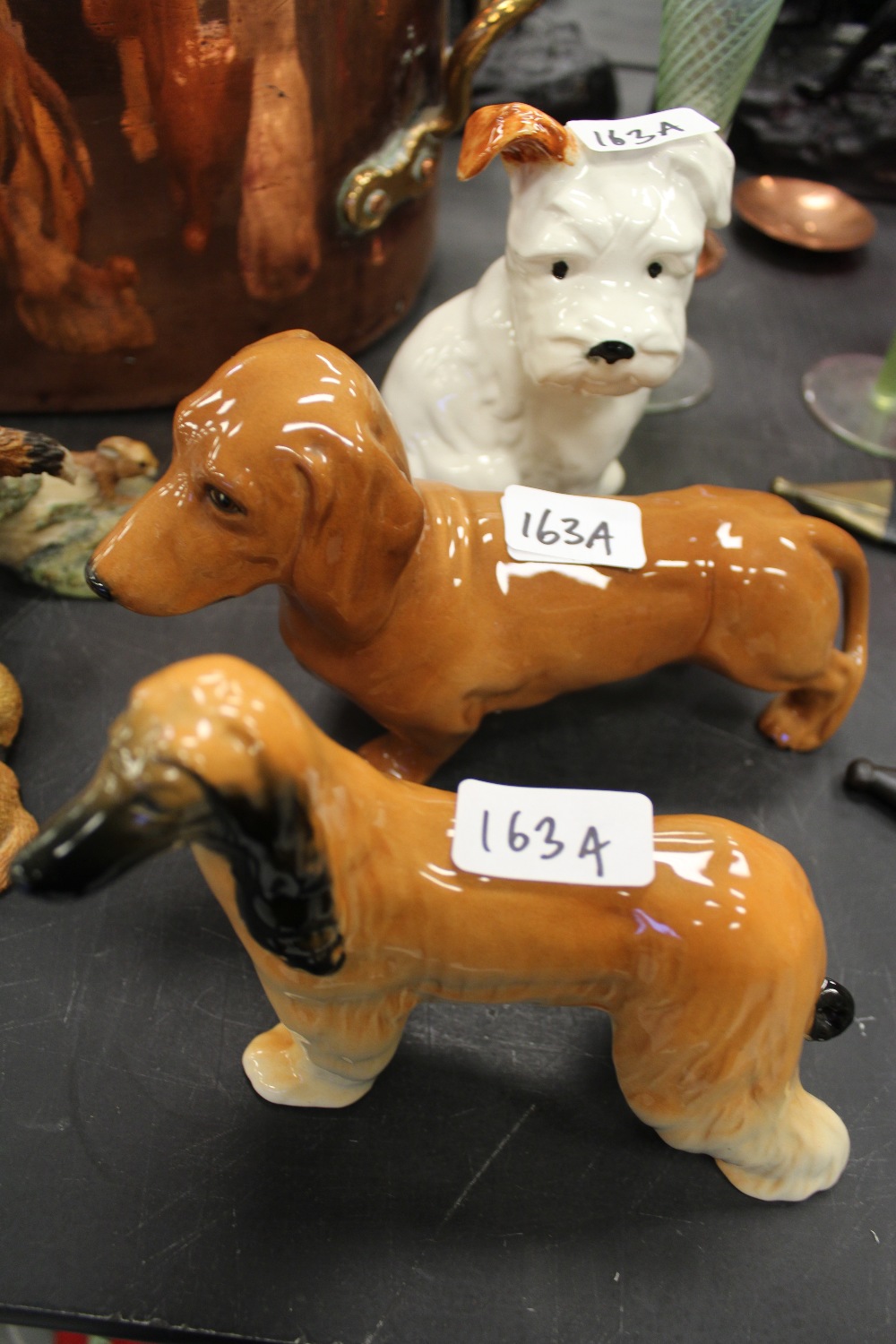 3 Beswick dogs: Puppy Seated 308, Afghan 'Hajubah of Derien' 2285 and Large Dachshund 361