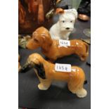 3 Beswick dogs: Puppy Seated 308, Afghan 'Hajubah of Derien' 2285 and Large Dachshund 361