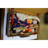 Two early 20th Century Chinese Celluloid Head Dolls in Original Clothing (in brown leather