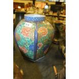 An antique Chinese porcelain hexagonal Baluster Vase, the sides enamelled with blossom, within