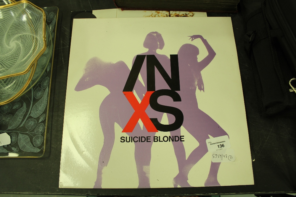 Two vinyl EPs - Primal Scream Dixie-Narco and INXS Suicide Blonde