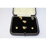 Harlequin 9ct/18ct gold shirt stud set, boxed