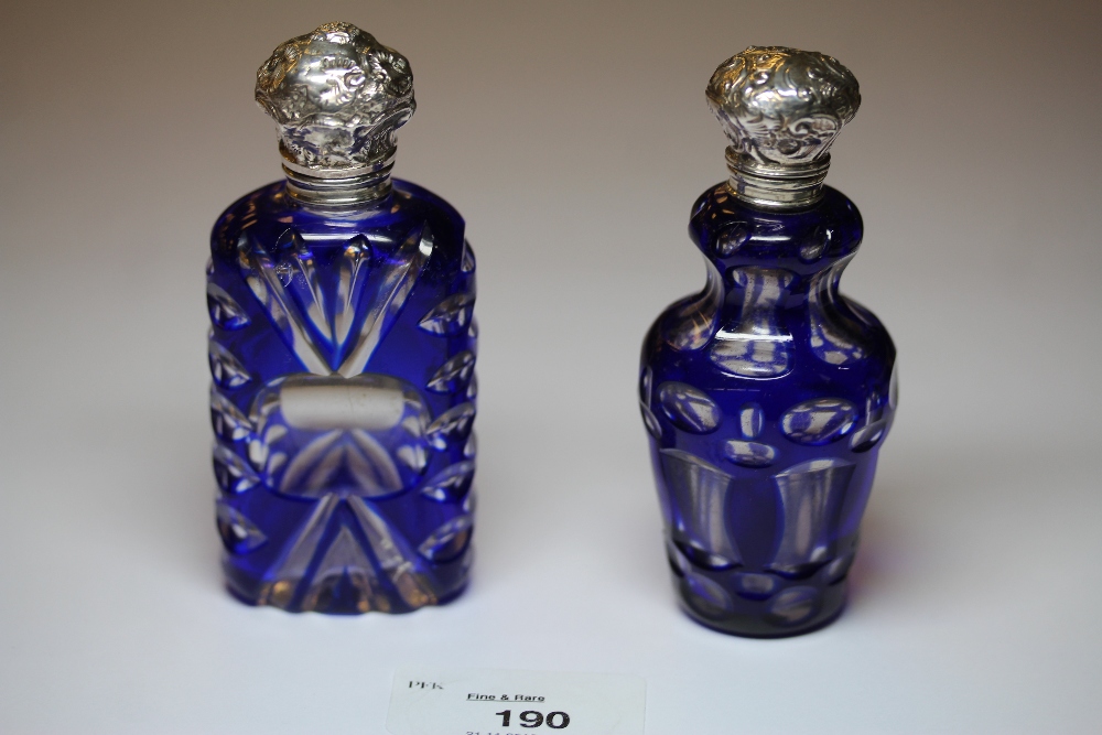 Two Victorian white metal (thought silver) mounted blue flashed and cut glass scent bottles, - Image 2 of 2