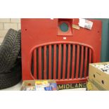 Red painted grill and fibreglass badge from a Midland S14/17 Series single decker bus (c. 1954-