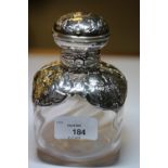 Edward VII embossed silver mounted and clear glass table scent bottle, the mount by William