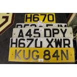 Five plastic number plates including KUG 84N (some a.f.)