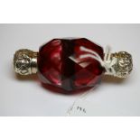 Victorian white metal (thought silver) mounted double ended ovoid ruby glass scent bottle, with