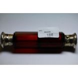 Victorian gilt metal double ended ruby glass scent bottle, slight dent to one cover, lacking
