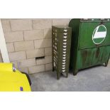 Vintage green painted metal fifteen drawer filing chest, containing a quantity of vehicle and