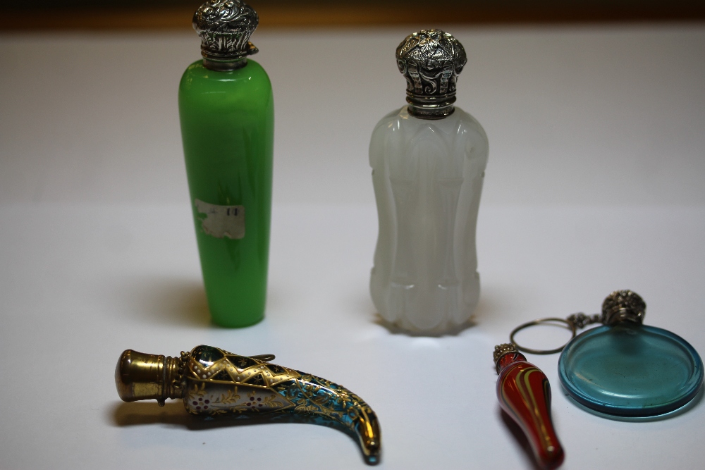 Victorian white metal (thought silver) mounted cut milk glass scent bottle, the mount worded 'MORDAN