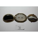 Three agate brooches in gilt metal mounts