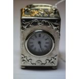 Edward VII embossed silver miniature carriage timepiece, the case by William Comyns, London 1903,