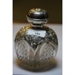 Edward VII embossed silver mounted cut glass table scent bottle, the mount by Henry Matthews,