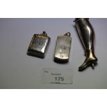 Victorian hinged silver match holder, Victorian silver stamp holder (both engraved) and a white