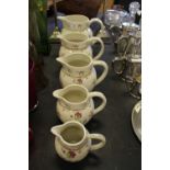 5 Graduated Ironstone Jugs