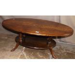 Oval Oak Coffee Table with Under Tier Supported on Cabriole Legs with Turned Centre Spindles 47"