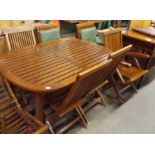 Very Good Quality Solid Teak Patio Table with Extension Leaf and Six Folding Matching Chairs with