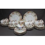 Edwardian Tea Set with Garlands of Flowers comprising 9 cups, saucers and tea plates with cake plate