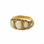 Three stone opal ring. No condition reports for this sale.