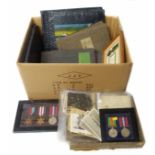 WWII British Service medals and various postcard albums and photographs. No condition reports for