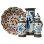 Two Japanese blue and white vases and covers, spill vase, also an Imari plate. No condition