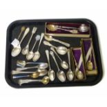 An assortment of teaspoons (24 in total) inc. two matched engraved teaspoons in boxes, a boxed
