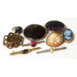 Eight assorted brooches to include a Victorian Pinchbeck mourning brooch, silver Blue-John set,