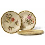 A pair of Worcester blush ivory cabinet, wall plates 23 cm diameter with flutes and shaper outline