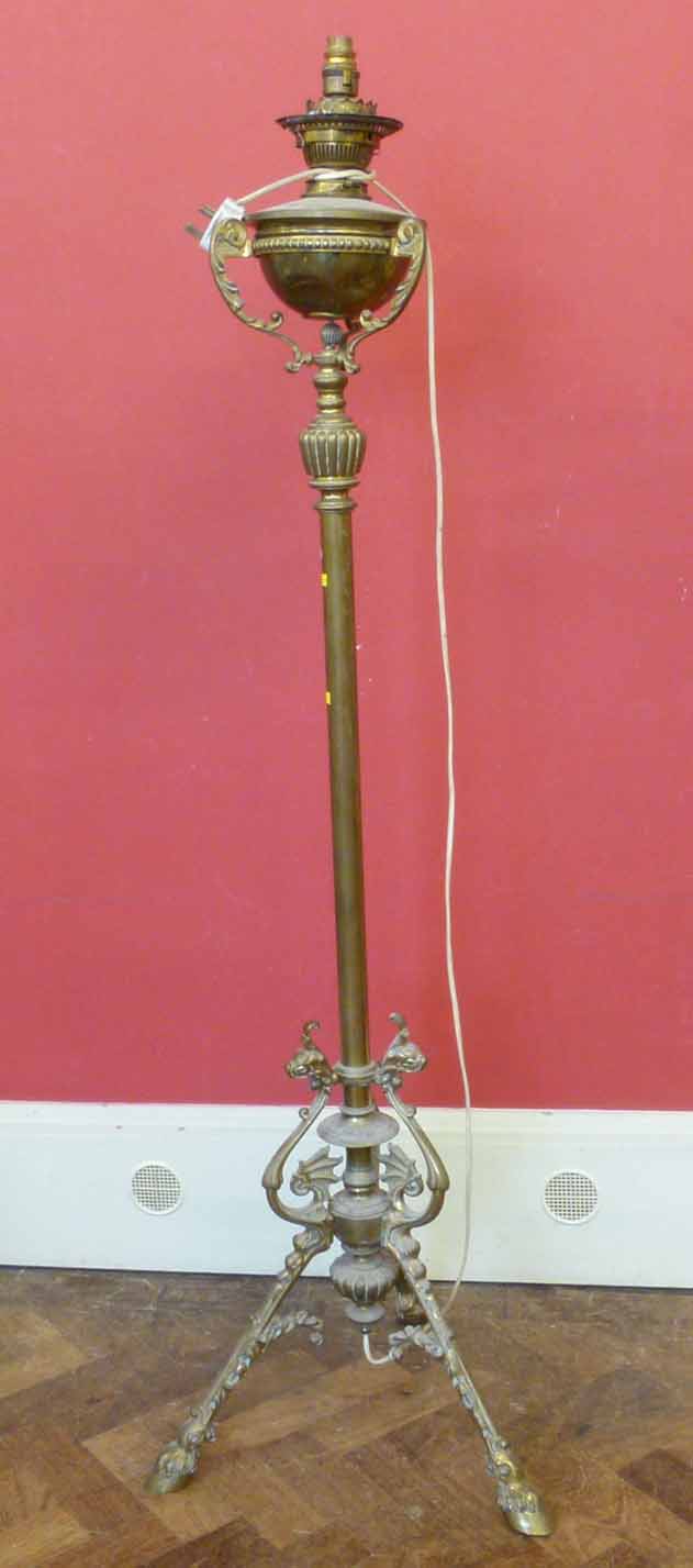 Brass art nouveau adjustable standard lamp with oil lamp No condition reports for this sale.