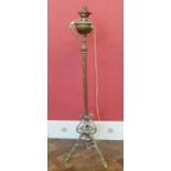 Brass art nouveau adjustable standard lamp with oil lamp No condition reports for this sale.