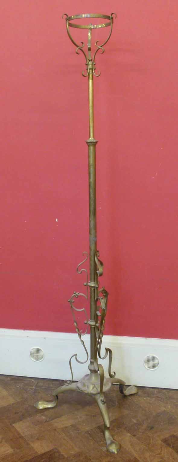 Brass art nouveau adjustable standard lamp with oil lamp No condition reports for this sale.