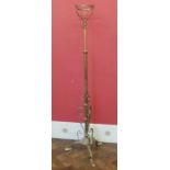 Brass art nouveau adjustable standard lamp with oil lamp No condition reports for this sale.