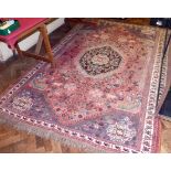 A Persian pink ground carpet (280cm x 190cm) No condition reports for this sale.