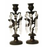 Pair of bronze candlestick lustres. No condition reports for this sale.