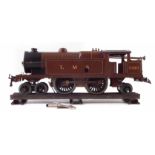 Hornby Tin plate clockwork 4-4-2 locomotive in L.M.S livery, finished maroon (faded to brown) with