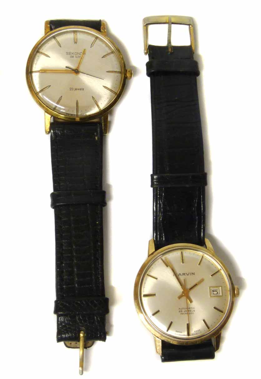 Marvin automatic 25 jewel incabloc 9ct gold gents wristwatch and Sekonda watch. No condition reports
