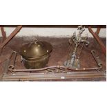 An Edwardian brass oval coal bucket, A copper and brass kerb and a brass hearth tidy No condition
