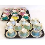 Nineteen Aynsley coffee cans and saucers in Harlequin colours No condition reports for this sale.