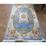 Pink and creme Shanghai woollen carpet, 5ft x 8ft, creme/blue. No condition reports for this sale.