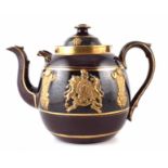 Large Staffordshire Royal commemorative teapot decorated with an overall treacle glaze, moulded with