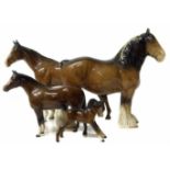 Beswick Shire, two horses and a foal. No condition reports for this lot.