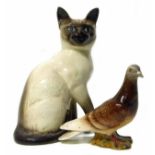 Beswick Pigeon and Siamese cat. No condition reports for this lot.