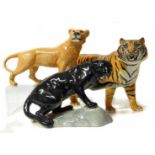 Beswick Tiger, Lioness and Puma on rocks. No condition reports for this lot.