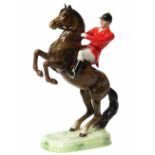 Beswick rearing horse and rider, damaged tip of ear only. No condition reports for this lot.