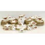 Seventy four pieces of Royal Albert "Old Country Roses" including seven calendar plates, ten side