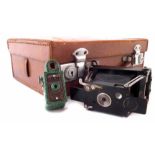 Coronet midget camera, green marbled body, also an Ensign Ensignette camera, together with a