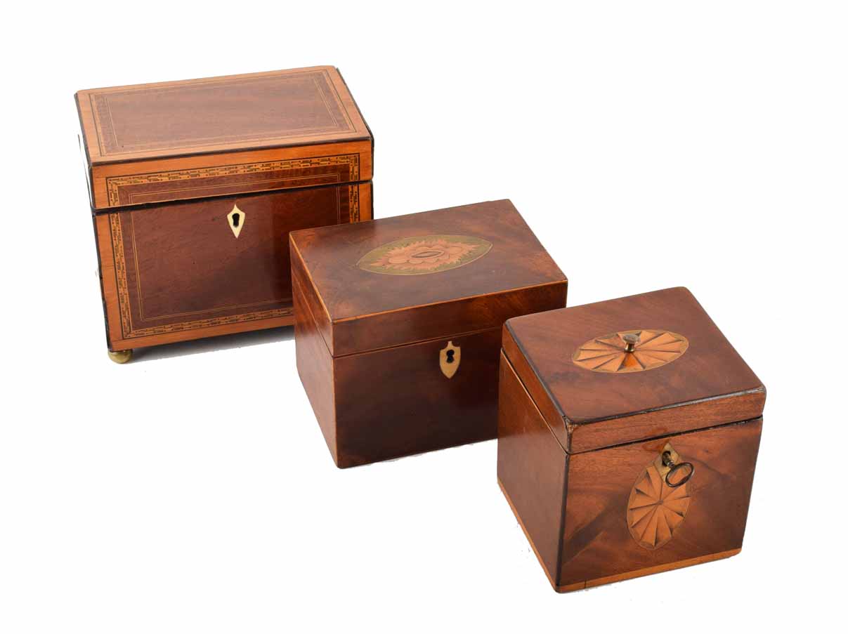 Three 19th century mahogany caddies. One double section tea caddy with dogstooth crossbanding and