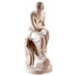 Minton Parian figure of Solitude, modelled seated on a rocky base with stalk at her side, Art