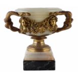 A mid 19th century onyx and ormolu twin handle vase. With bronze handles in the shape of serpents