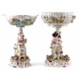 Two Carl Thieme Potschappel table centres, with pierced and encrusted basket bowls supported on tree